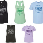 5 t-shirts and tank tops in different colors in a row
